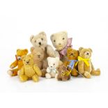 Nine small teddy bears, a Hamiro white wool plush teddy baby --9in. (23cm.) high; a post-war