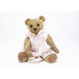 'Ruby' an early Chad Valley teddy bear 1915-20, with blonde mohair, replaced orange and black