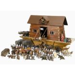 A large German painted wood Noah's Ark, with painted log and plank construction, lift off roof and