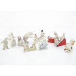 Ten bisque Snow Babies and other frosted pieces, two babies riding a 1st World War tank --2 ¼in. (