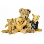 Three post-war Pedigree teddy bears, the largest with dark blonde mohair, orange and black glass