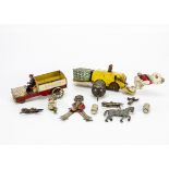 German tinplate toys and spares, a Lehmann Ehe ---6 ¾in. (17cm.) long (missing front wheels); a