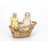 A small Simon & Halbig for Kämmer & Reinhardt child doll, with brown sleeping eyes, jointed