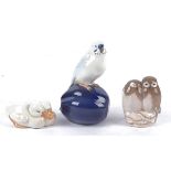 A Royal Copenhagen porcelain model of a Budgerigar, no.4682, height 14.5cm, together with an owl