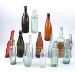 A group of collectable vintage bottles, to include a Shell oil company example, 'The Shell Oil
