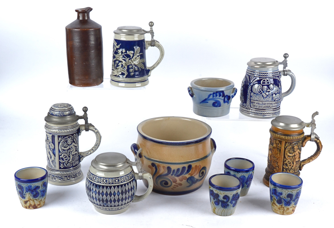 A small group of German salt glazed stonewares, to include pewter mounted steins, pots, cups, and