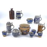 A small group of German salt glazed stonewares, to include pewter mounted steins, pots, cups, and