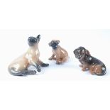Three Royal Copenhagen porcelain pet figures, a Siamese cat, no.2862, height 10cm, dachshund no.3140