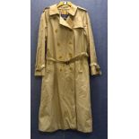 An original Burberry Prorsum classica ladies full length trench raincoat with belt, tartan interior,