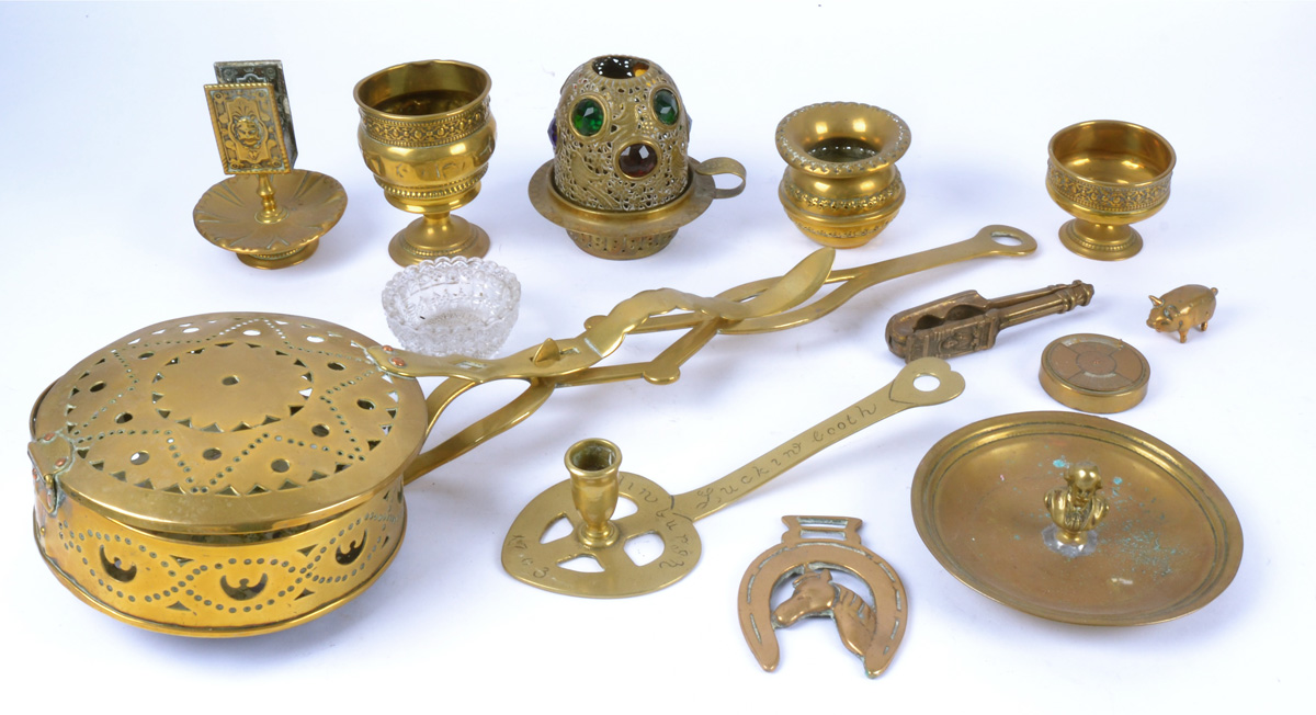 A small quantity of brassware, to include a nutcracker and serving dish with Shakespeare as a theme,