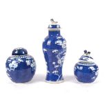 A group of three Chinese underglaze blue and white blossoming prunus on cracked ice pattern