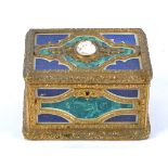 An early 20th Century ormolu mounted lapis lazuli and malachite effect table casket, with central