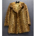 A 1930's lady's vintage J. K. Bauers snow leopard fur coat, hook fastenings, brown satin lining,