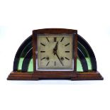 A Garrard Art Deco style mantle clock, square cream dial within an arched oak case with two tone