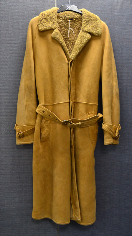 A gentleman's vintage long coat by Huc of Sweden, single breasted suede exterior with front pockets,