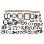 A selection of antique buckles, assorted sizes and designs, together with a quantity of musket balls