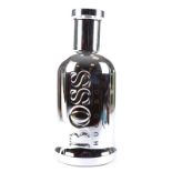 A large Hugo Boss display bottle, silvered effect, height 42cm