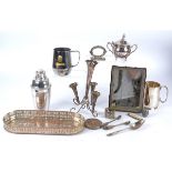 An extensive quantity of silver plate to include a four footed and three fluted silver plated