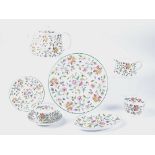 A Minton Haddon Hall pattern tea set, consisting of eight cups, eight saucers, eight side plates,