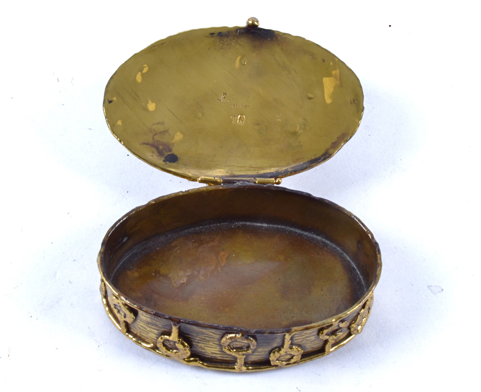 An Arts & Crafts polished brass oval box, with floral decoration and inset with stones, hinged - Image 2 of 2