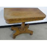 A William IV rosewood folding card table, the folding top opens to reveal green felted top, on