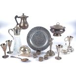 A silver plated hot water pot with wicker handle, the base with a mark of a putto in a shield,