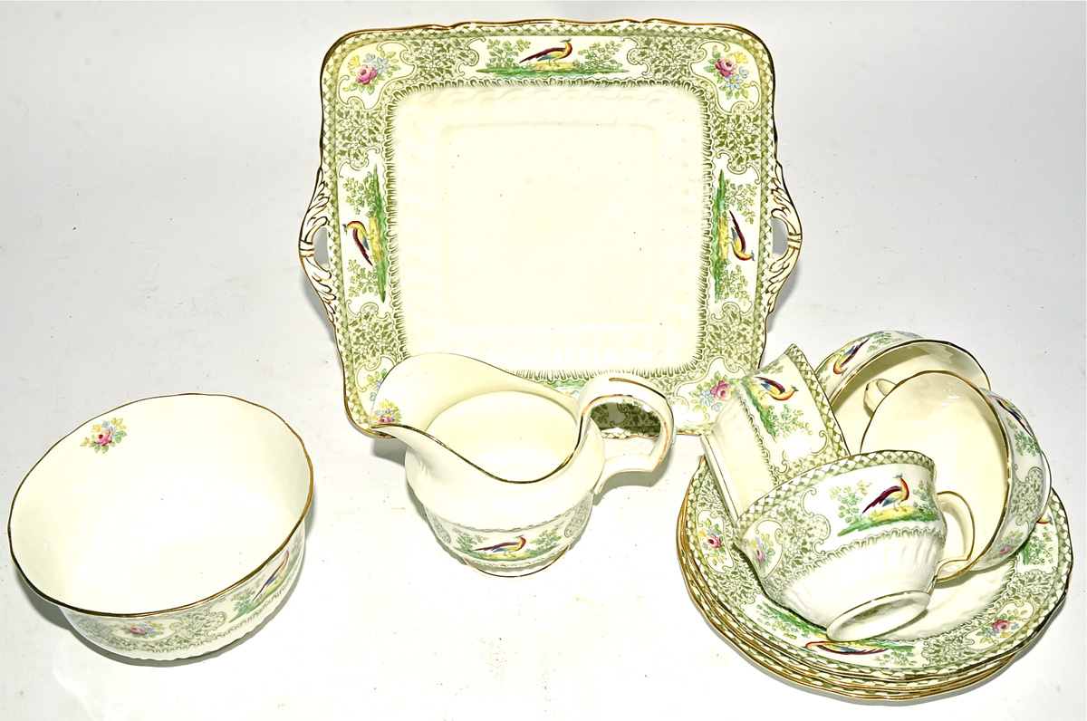 A twelve piece early 20th Century tea set by Faisan Radfordian, the moulded china with transfer