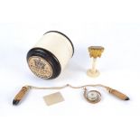 A small selection of 19th Century sewing implements, including a mother of pearl tape measure