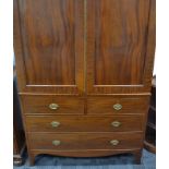 A 19th Century mahogany linen press, moulded cornice, double flamed mahogany doors with boxwood