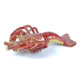 A 20th Century pottery dish modelled as a lobster, unsigned, length 41cm AF
