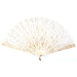 A late 19th Century Brussels bobbin lace folding fan, the lace leaf designed with flowers and