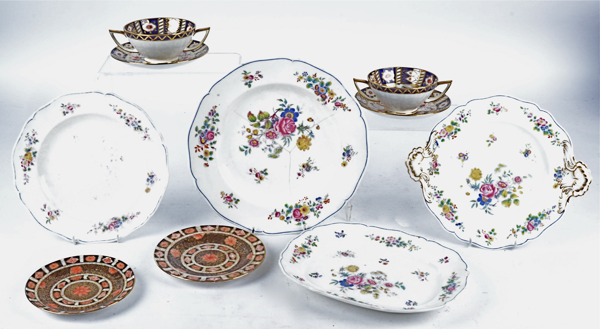 Four Minton china twin handled soup cups and saucers in the Imari taste, together with two similar