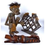 A selection of African style carved decorative interior items, including CD rack, wine rack,