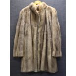 A lady's vintage three quarter length silver fox fur coat, by M + Michaels Furs of Bristol, grey