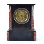 A late Victorian black slate mantle clock, with marble pilasters and gilt line decoration on a