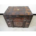 An antique elm silver strong box, carved front panel, metal bound body, double lock, inner drop in