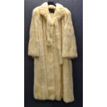 A lady's vintage full length fur coat made exclusively for Harrods by Grosvenor of Canada, white