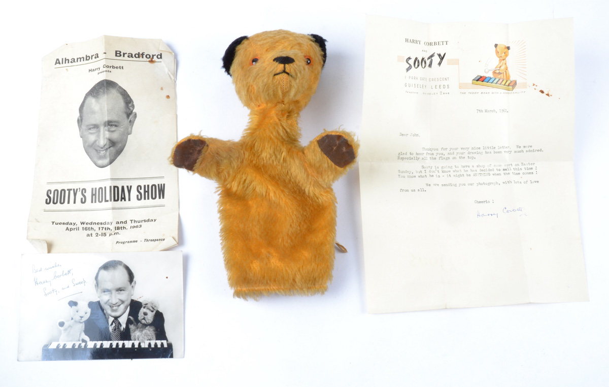 A Sooty hand puppet with an autographed photo card signed by Harry Corbett, and a signed letter