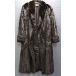 A lady's vintage three quarter length fur coat made exclusively for Harrods by Grosvenor of