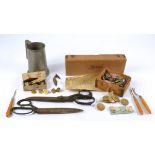 A collection of lace and sewing equipment, including scissors, thimbles, a set of seven carved