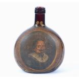 A circular brown glass bottle with hand painted portrait of Hugo De Groot with a painted inscription