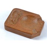 A Robert Mouseman carved oak ashtray, of rectangular form with carved mouse figure to the surface.