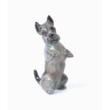 A Royal Doulton animal figure of a Scottish Terrier K10, a black and grey Scottie dog seated upright