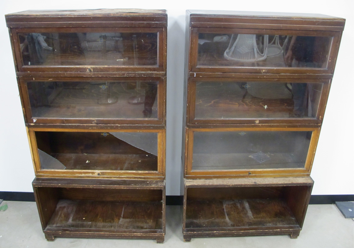 A pair of Globe Wernicke four section bookcases, open base, three glazed sections and a fitted