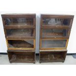 A pair of Globe Wernicke four section bookcases, open base, three glazed sections and a fitted