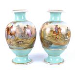 A pair of continental porcelain vases, painted with landscapes and figures, highlighted in gilt,