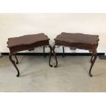 A pair of early 20th Century mahogany Chippendale style silver tables, 85cm wide, 71cm high and 58cm