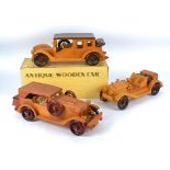Three wooden classic cars by 'Woodentops of London', two boxed one not, length 40cm, together with a