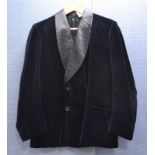 A gentleman's grey cotton tailcoat, with cream lining and matching waistcoat and trousers, a black