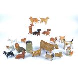 A collection of Beswick dogs, including a Jack Russell, Labrador Retriever, Dalmatian, Australian